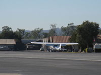 N704UT @ SZP - 1976 Cessna 150M, Continental O-200 100 Hp, finally near touchdown landing on Rwy 22 in gusty crosswind - by Doug Robertson