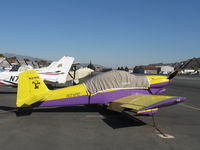 N21PE @ SZP - 2010 Mortenson VAN's RV-4, Lycoming O-320 160 Hp, FELIX the CAT logo on tail, on transient line - by Doug Robertson