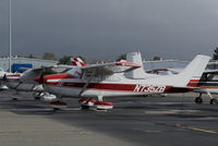 N735ZB @ KCCR - Locally-based 1977 Cessna 182Q @ Buchanan Field, Concord, CA with cockpit cover and for sale signs (now registered to owner in Moab, UT) - by Steve Nation