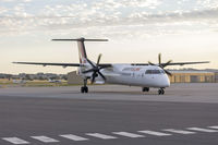 VH-QOK @ YSWG - QantasLink (VH-QOK) Bombardier DHC-8-402Q taxiing at Wagga Wagga Airport. - by YSWG-photography