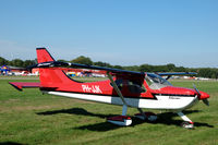 PH-JJK @ EHSE - Glasair Sportsman 2+2 parked at Breda airport (Seppe), the Netherlands - by Van Propeller