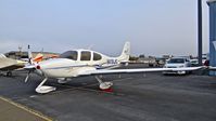 N418JC @ KRHV - 2004 Cirrus SR22 sitting on the TradeWinds ramp (for sale) at Reid Hillview Airport, San Jose, CA. - by Chris Leipelt