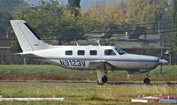 N9123V @ KRHV - California-based 1987 Piper Malibu rolling down 31R after landing at Reid Hillview Airport, San Jose, CA. - by Chris Leipelt