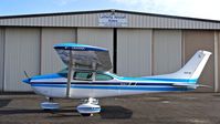 N1610M @ KRHV - Dick James and Associates Inc. (Sacramento, CA) 1975 Cessna 182P parked in front of the Lafferty Aircraft Sales hangar at Reid Hillview Airport, San Jose, CA. - by Chris Leipelt