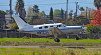 N9123V @ KRHV - California-based 1987 Piper Malibu departing runway 31L at Reid Hillview Airport, San Jose, CA. - by Chris Leipelt