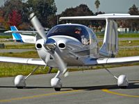 N854AK @ KRHV - Locally-based 2005 Diamond Star 40 taxing out for departure at Reid Hillview Airport, San Jose, CA. - by Chris Leipelt