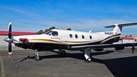 N462PC @ KHWD - Mountain Aviation LLC (Livermore, CA) 2002 Pilatus PC-12 parked beside the Mather hangar at Hayward Executive Airport, Hayward, CA. - by Chris Leipelt