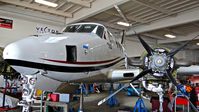 N8096U @ KHWD - Reid Hillview-based 1993 Beechcraft King Air C90A parked in the Mather hangar for a huge inspection at Hayward Executive Airport, Hayward, CA. - by Chris Leipelt