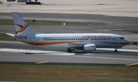 PZ-TCQ @ MIA - Suriname 737 - by Florida Metal
