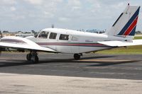 N8221T @ KLAL - Departing Lakeland, FL - Sun N Fun 2013 - by Bob Simmermon