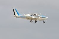 N8668Y @ KLAL - Arriving at Lakeland, FL with door already open!  Sun N Fun 2013. - by Bob Simmermon