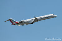 N549NN @ KSRQ - American Flight 5139 operated by PSA (N549NN) departs Sarasota-Bradenton International Airport enroute to Charlotte-Douglas International Airport - by Donten Photography