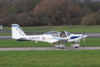 G-BYWV @ EGXU - taxi to apron from runway 04, - by Jez Poller
