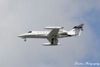 N335MR @ KSRQ - Learjet 23 (N335MR) arrives at Sarasota-Bradenton International Airport - by Donten Photography