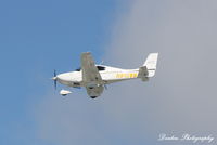 N910WM @ KSRQ - Cirrus SR-20 (N910WM) arrives at Sarasota-Bradenton International Airport - by Donten Photography