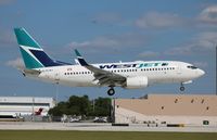 C-FLWJ @ FLL - West Jet - by Florida Metal