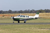 VH-FIM @ YTEM - Bizair Aircraft (VH-FIM) Beech A36 Bonanza taxiing at Temora Airport. - by YSWG-photography