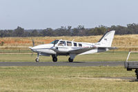 VH-UKL @ YTEM - Beech 58 Baron (VH-UKL) taxiing at Temora Airport. - by YSWG-photography