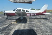 N5881V @ KBMG - On the ramp at Bloomington, IN - by Bob Simmermon