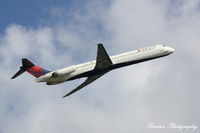 N974DL @ KSRQ - Delta Flight 2298 (N974DL) departs Sarasota-Bradenton International Airport enroute to Hartsfield-Jackson Atlanta International Airport - by Donten Photography