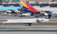 N719SK @ KLAX - CL-600-2C10
