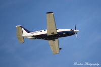 N218TG @ KSRQ - Socata TBM-700 (N218TG) departs Sarasota-Bradenton International Airport enroute to Palm Beach International Airport - by Donten Photography
