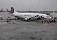 N779AS @ KOAK - Alaska Airlines 1994 737-4Q8 between flights @ Oakland International Airport, CA - by Steve Nation