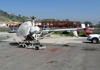 N6001X @ KWHP - Locally-based 1990 Schweizer 269C with cockpit cover and minus rotor blades @ Whiteman Airport, Pacoima, CA (now based in Austin, TX) - by Steve Nation