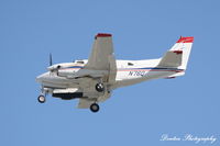 N76Q @ KSRQ - Beechcraft King Air 90 (N76Q) arrives at Sarasota-Bradenton International Airport - by Donten Photography