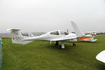 G-ZAZU @ X5FB - Diamond DA-42 Twin Star grounded by heavy mist at Fishburn Airfield's Wings and Wheels Day, October 3rd 2015 - by Malcolm Clarke