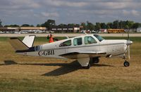 C-GBII @ KOSH - Beech A35 - by Mark Pasqualino