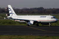SX-DGE @ EDDL - On its way to rwy 23L - by Günter Reichwein