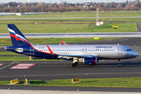 VQ-BPW @ EDDL - departing - on its way to rwy 23L - by Günter Reichwein
