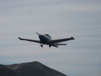 N91689 @ SZP - 1946 North American NAVION, Continental E225 Upgrade, takeoff climb Rwy 04 gear cycling up, Young Eagles flight - by Doug Robertson