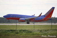 N276WN @ KRSW - Southwest Flight 228 (N276WN) departs Southwest Florida International Airport enroute to Chicago-Midway International Airport - by Donten Photography