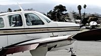 N361TC @ KRHV - Locally-based 1980 Beechcraft A36TC Bonanza taxing to Squadron 2 for maintenance at Reid Hillview Airport, San Jose, CA. - by Chris Leipelt