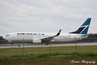 C-FPLS @ KRSW - WestJet Flight 1185 (C-FPLS) departs Southwest Florida International Airport enroute to Toronto-Pearson International Airport - by Donten Photography