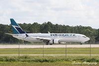 C-GJWS @ KRSW - WestJet Flight 1184 (C-GJWS) arrives at Southwest Florida International Airport following flight from Toronto-Pearson International Airport - by Donten Photography