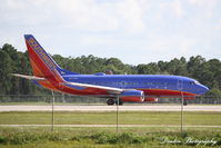 N247WN @ KRSW - Southwest Flight 1621 (N247WN) departs Southwest Florida International Airport enroute to Port Columbus International Airport - by Donten Photography