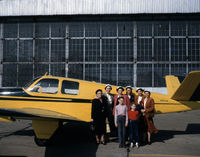 N8872A - This picture shows the airplane in 1952 after painting.  The picture was taken at the Meadville, Pa airport.  Beside the airplane are a woman's group as well as Franklin's wife on the far right and his children in the front. - by Franklin Miller by his son Lohring Miller