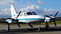 N6867L @ KRHV - Locally-based Cessna 421C preparing for its first departure as a local tenant at Reid Hillview Airport, San Jose, CA. This is it's temporary tie down as all the hangars are full at Reid Hillview. - by Chris Leipelt