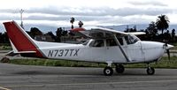 N737TX @ KRHV - Locally-based 1977 Cessna 172N taxing in after its last pattern at Reid Hillview Airport, San Jose, CA - by Chris Leipelt
