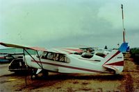 N2593E @ KTCY - 93E soon after purchase and needing some TLC. This was around 1984 and shows the sunburst paint scheme that was popular in the 70s.