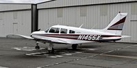 N1455X @ KRHV - Locally-based 1975 Piper PA-28R-200 with a flat tire parked just outside of the live taxiway until someone comes to rescue it. - by Chris Leipelt