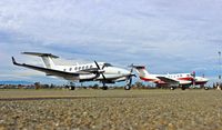UNKNOWN @ KRHV - Two King Airs parked next to each other, both for a 49er football game at Reid Hillview Airport, San Jose, CA. One is a King Air 250 from Central California and one is a King Air 200 from Southern California. No tail numbers on aircraft as per request. - by Chris Leipelt