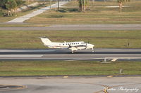 N700UT @ KTPA - Beechcraft Super King Air 350 (N700UT) departs Tampa International Airport enroute to Rock Hill Airport - by Donten Photography