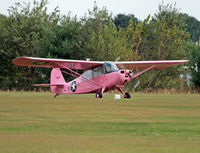 N3923A @ 8N1 - This old Aeronca has been creatively painted pink - she's probably one of a kind! - by Daniel L. Berek