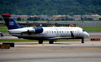 N458AW @ KDCA - Taxi national - by Ronald Barker