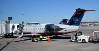 N242JS @ KCLT - Gate E1 CLT - by Ronald Barker