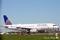 N491UA @ KSRQ - United Flight 1641 (N491UA) prepares for departure at Sarasota-Bradenton International Airport - by Donten Photography